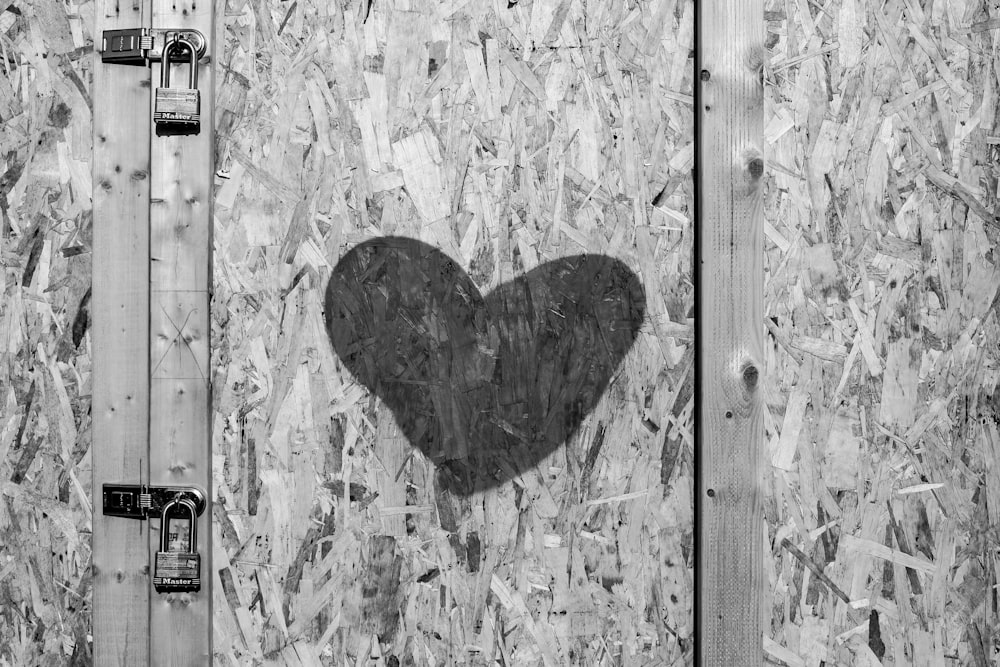 grayscale photo of heart shaped wall art