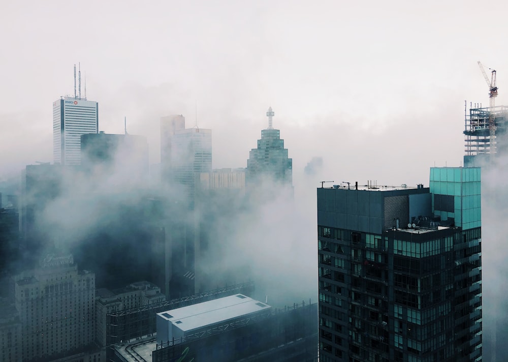 high rise buildings with smoke