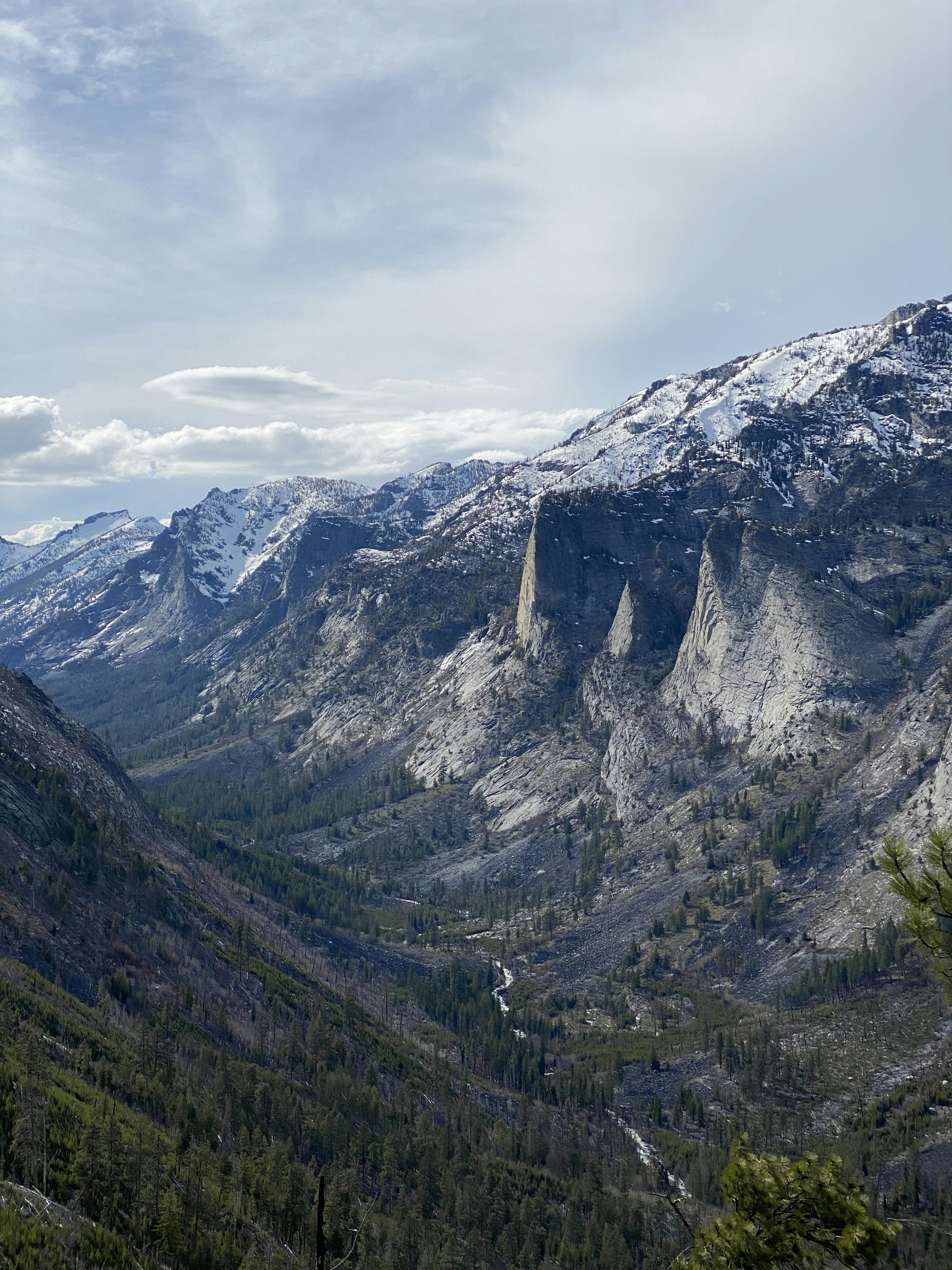 Green and gray mountains under white cloudy sky during daytime photo