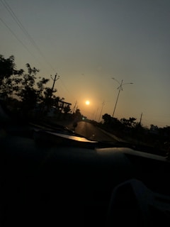 Sunset view over the layout with streetlights just beginning to glow along the roads.