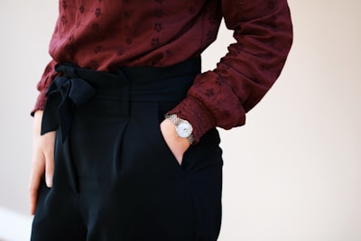 woman in black and pink floral long sleeve shirt