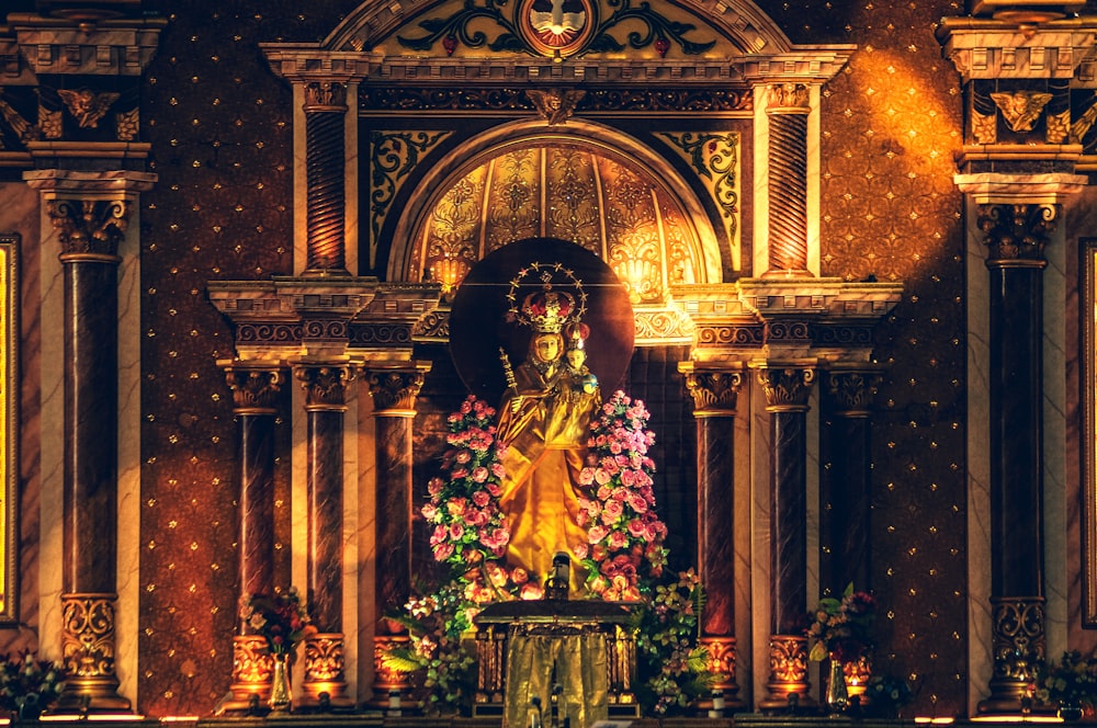 gold and black religious statue
