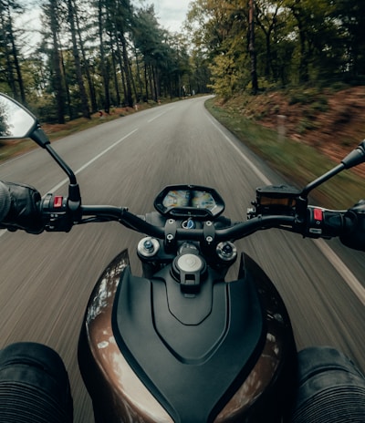 black and gray motorcycle on road during daytime