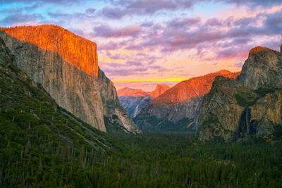 The Yosemite valley at sunrise, El Capitan on the left and Half Dome behind