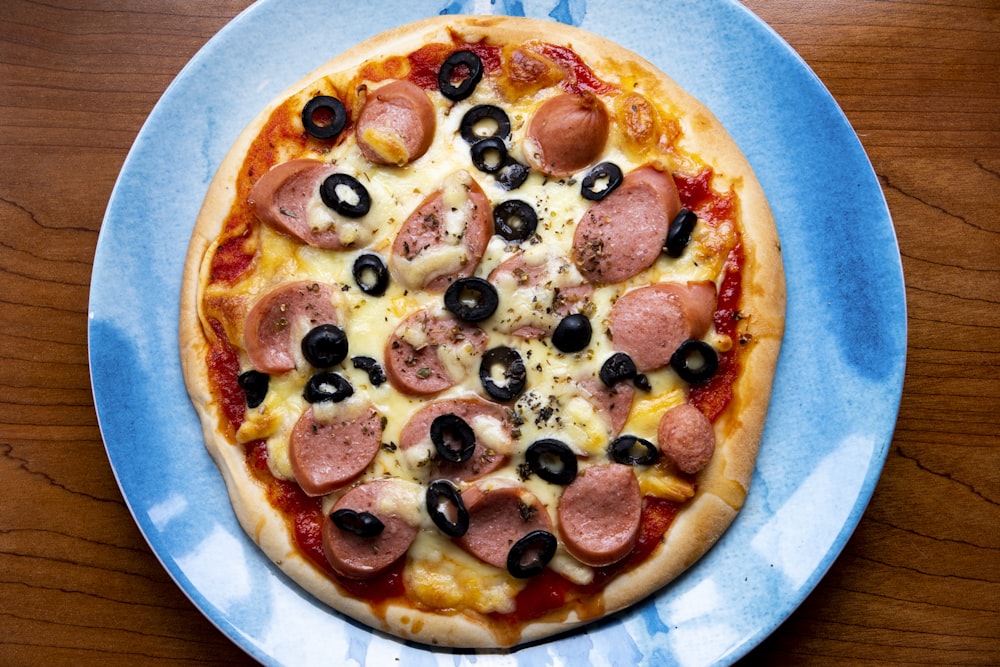pizza with black berries and cheese