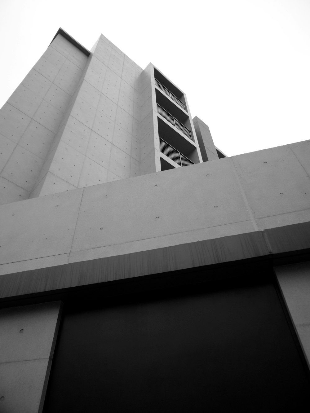 grayscale photo of concrete building