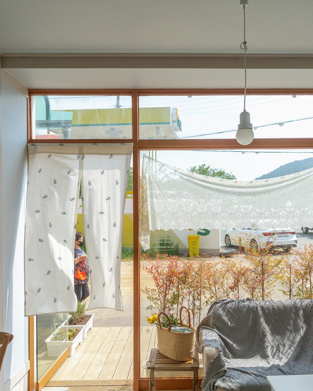 white and brown floral window curtain