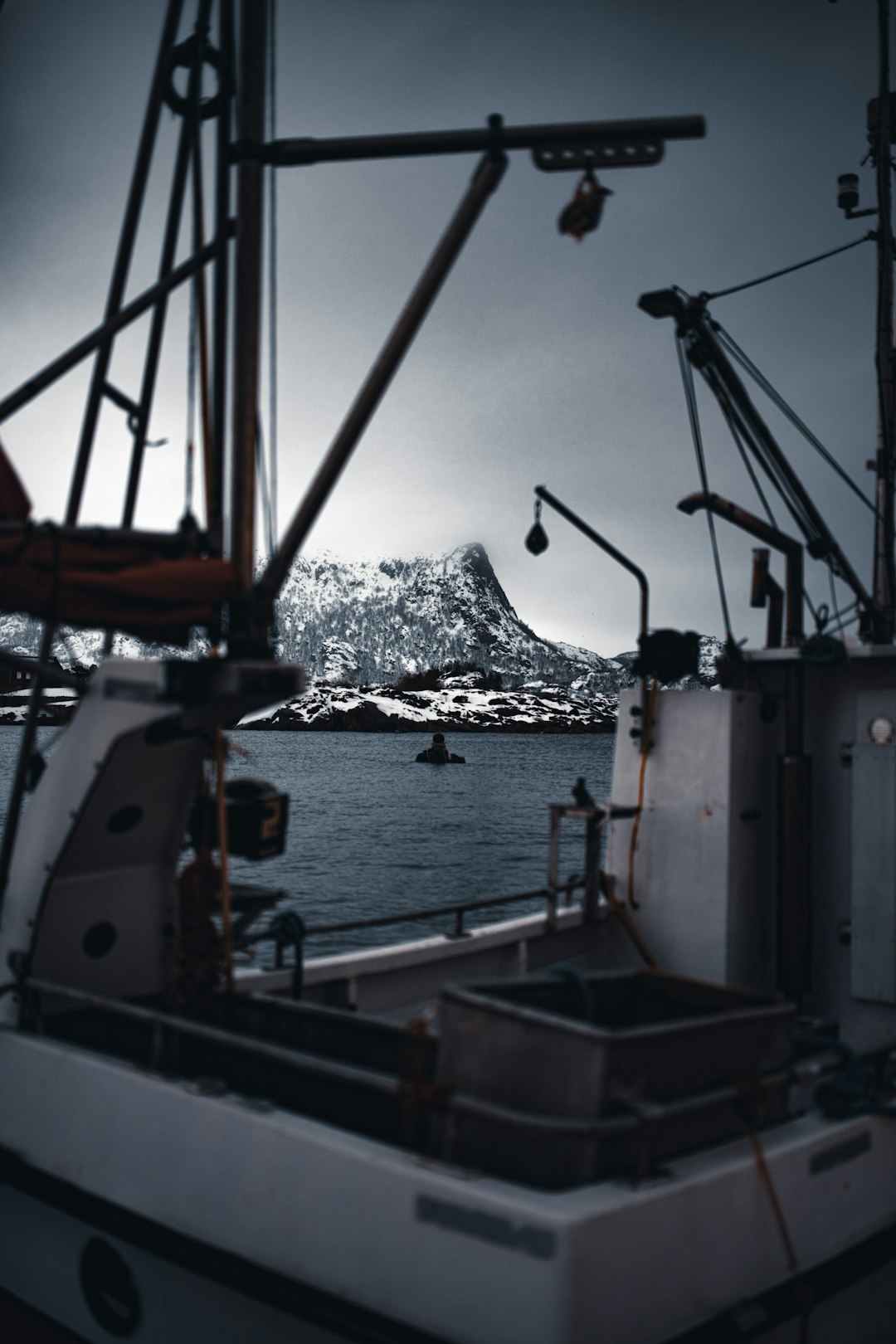 white and orange ship on sea during daytime