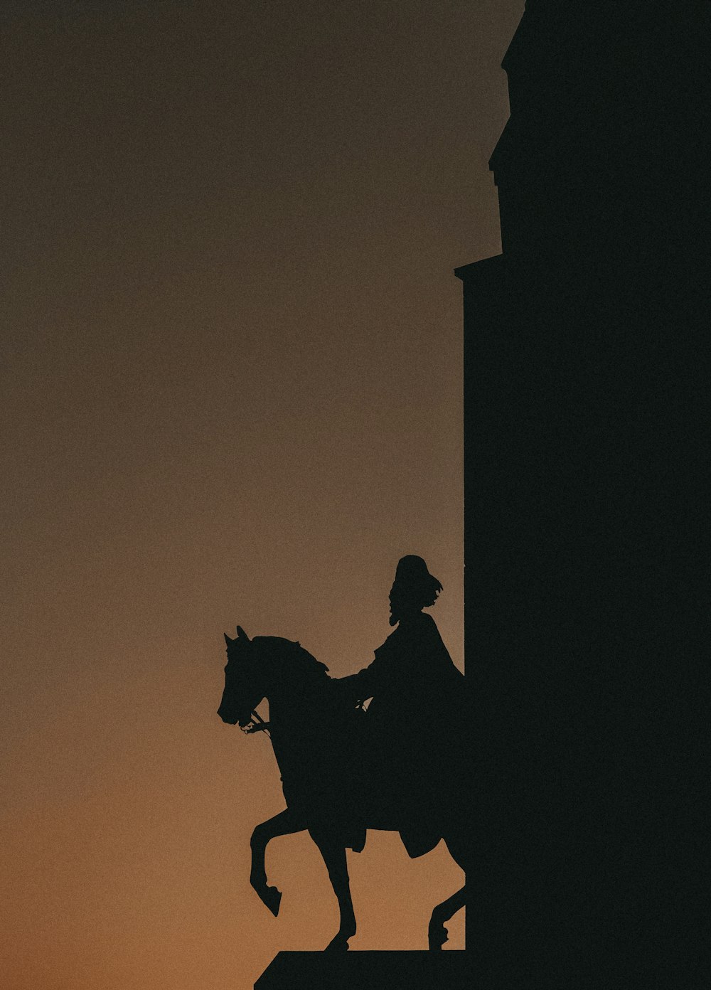 silhouette of man riding horse during sunset