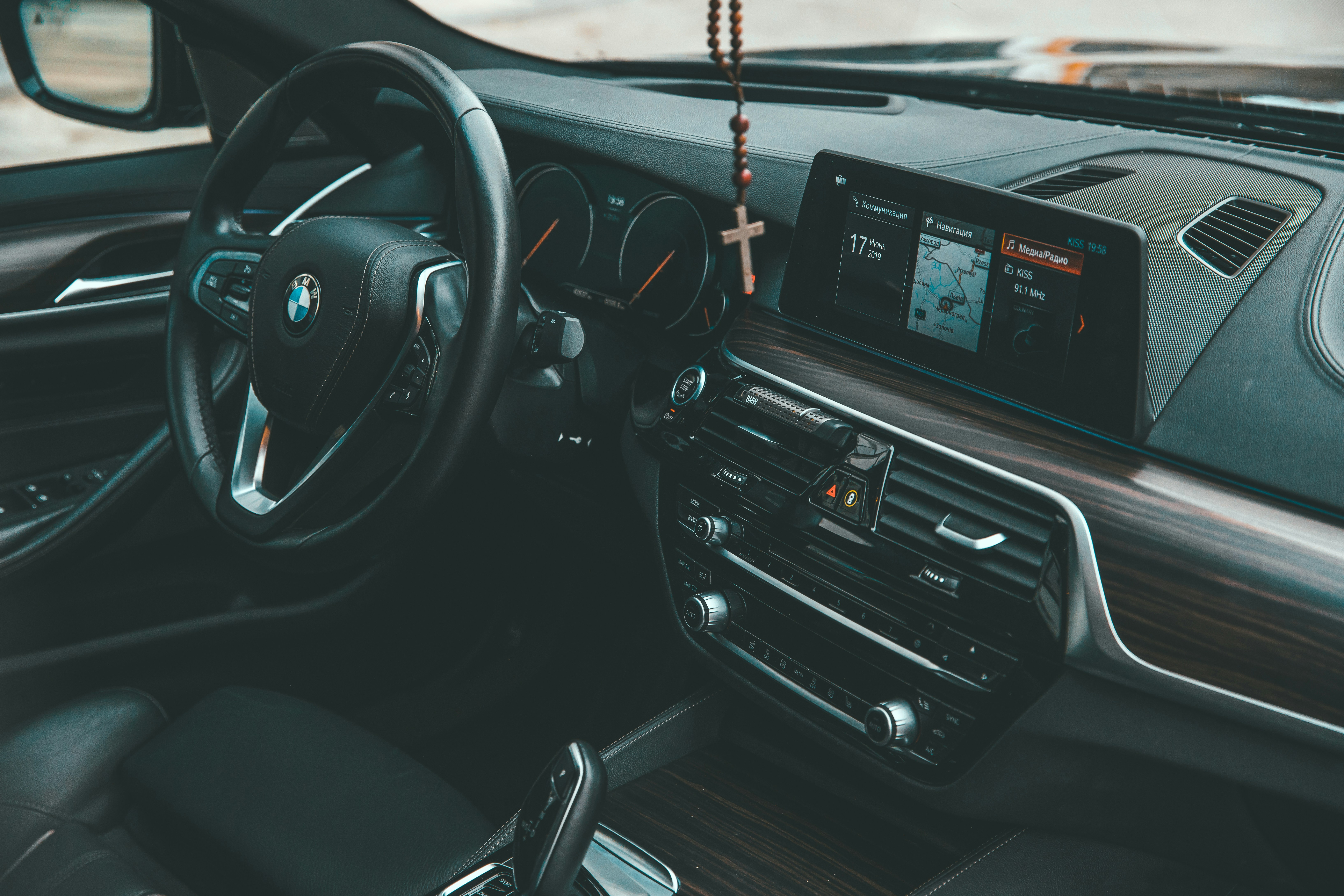 Modern interior and dashboard of a small electric SUV with digital displays