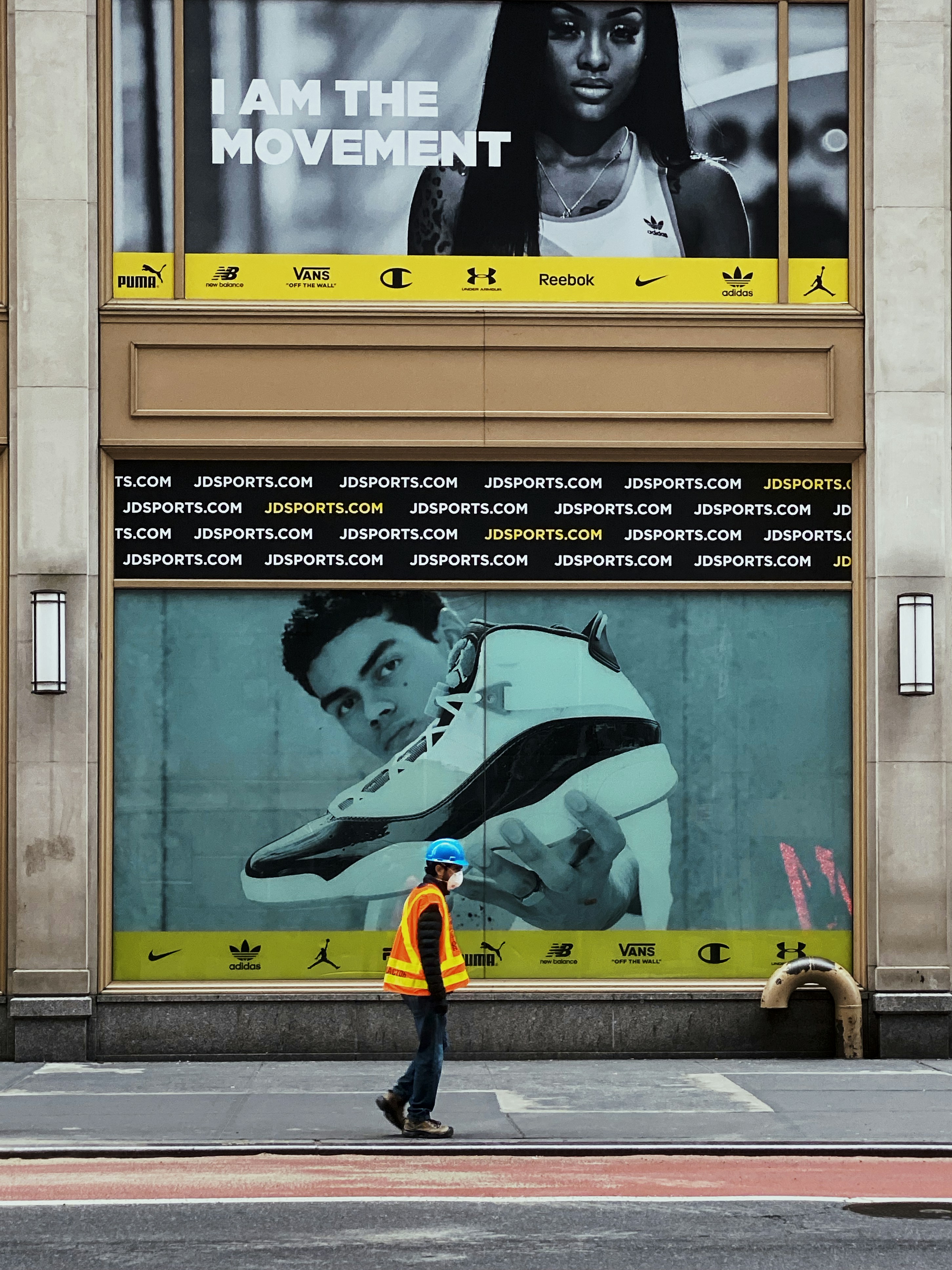 man in black jacket and black pants wearing white cap and black backpack