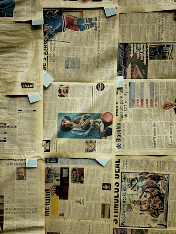 newspaper on brown wooden table