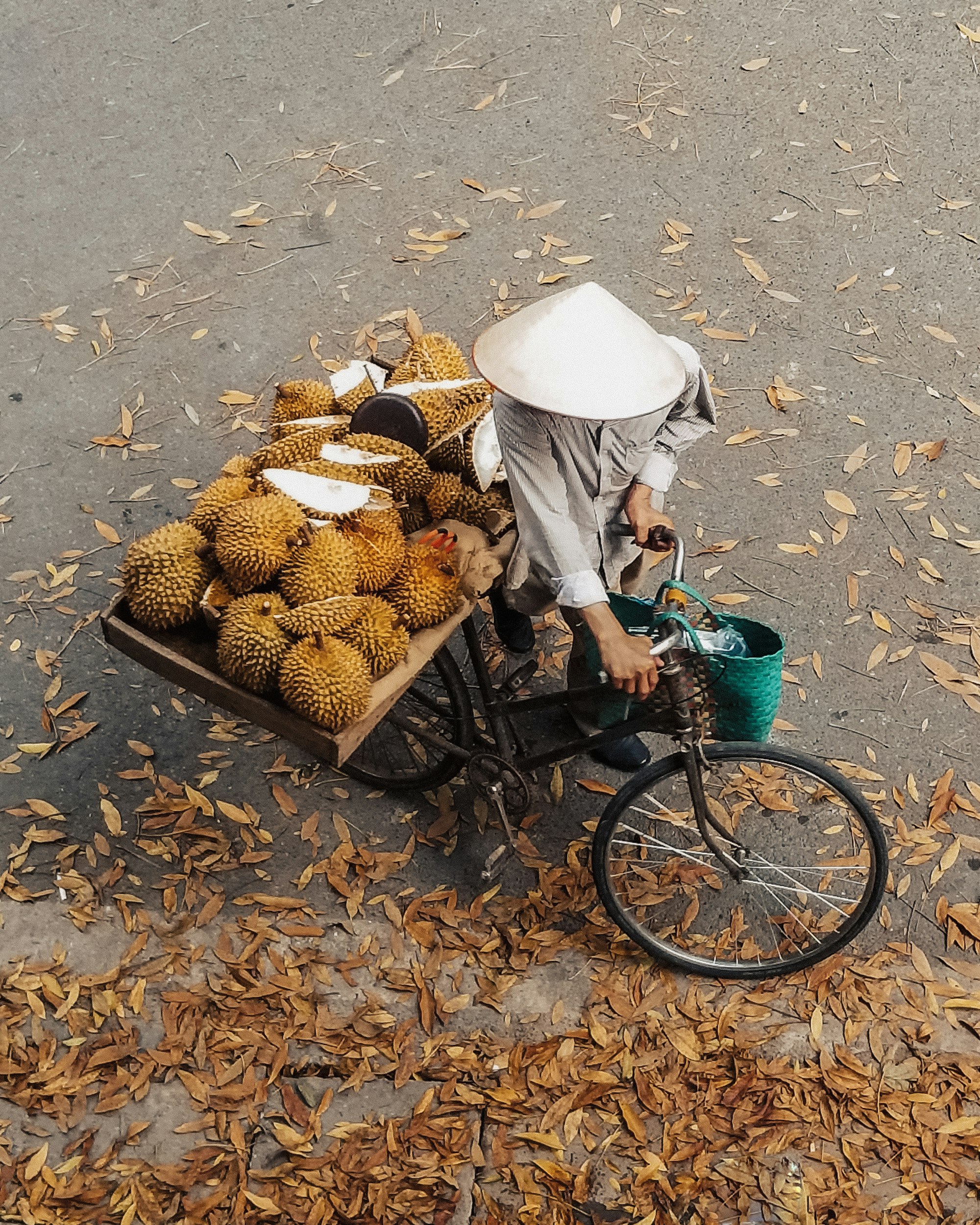 🍇🍈🍉🍊🥑 Mystery man in Hanoi selling durian fruit will never know how cool I think he looks 🇻🇳