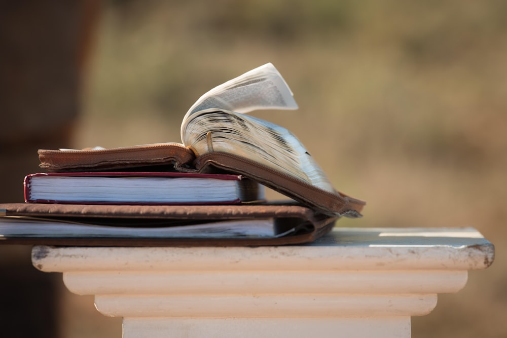 open book on brown wooden table