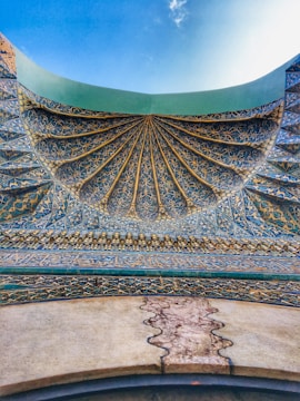 Abstract blue and gold digital arch symbolizing stability and resilience.