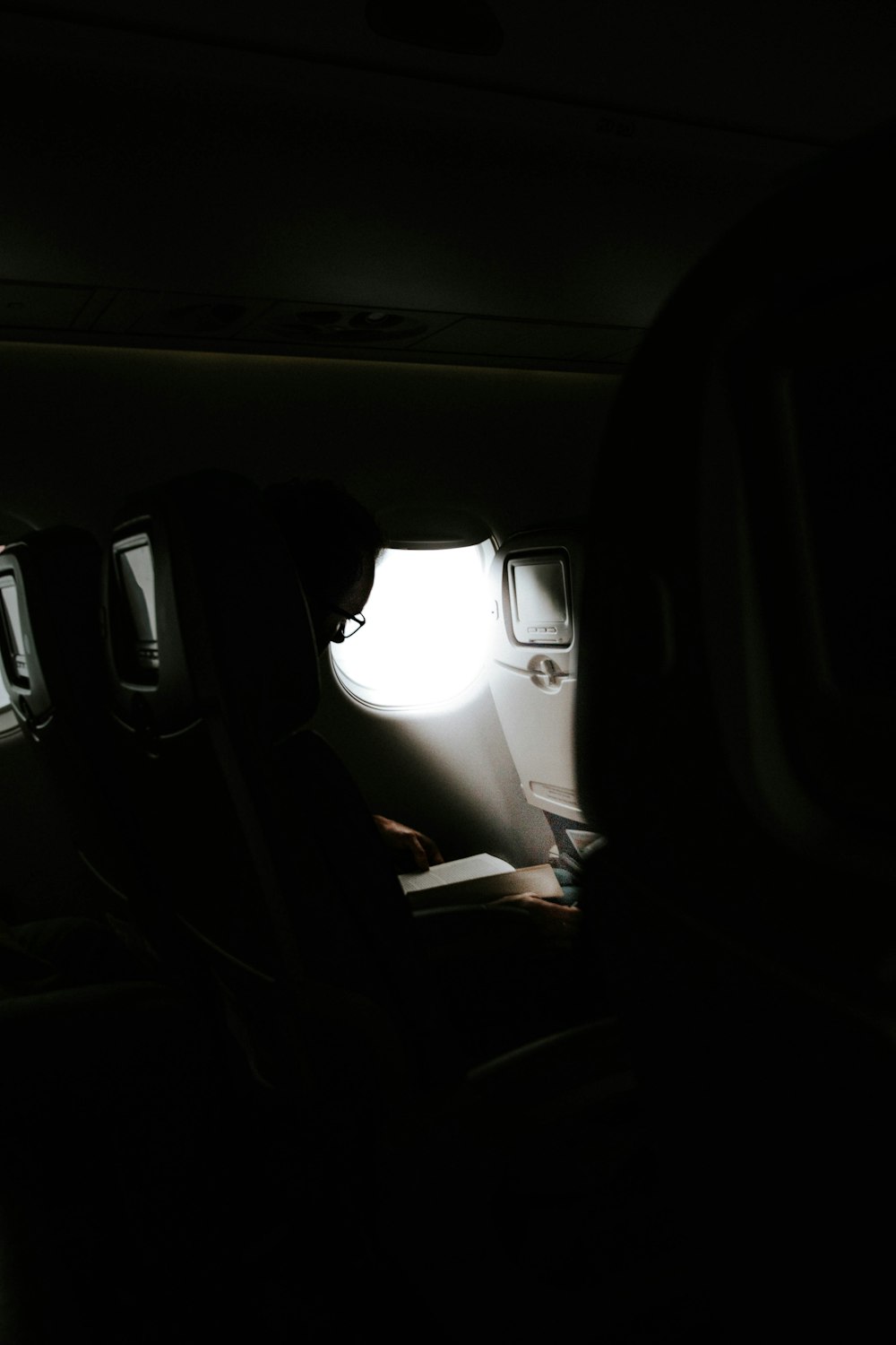 person sitting on car seat