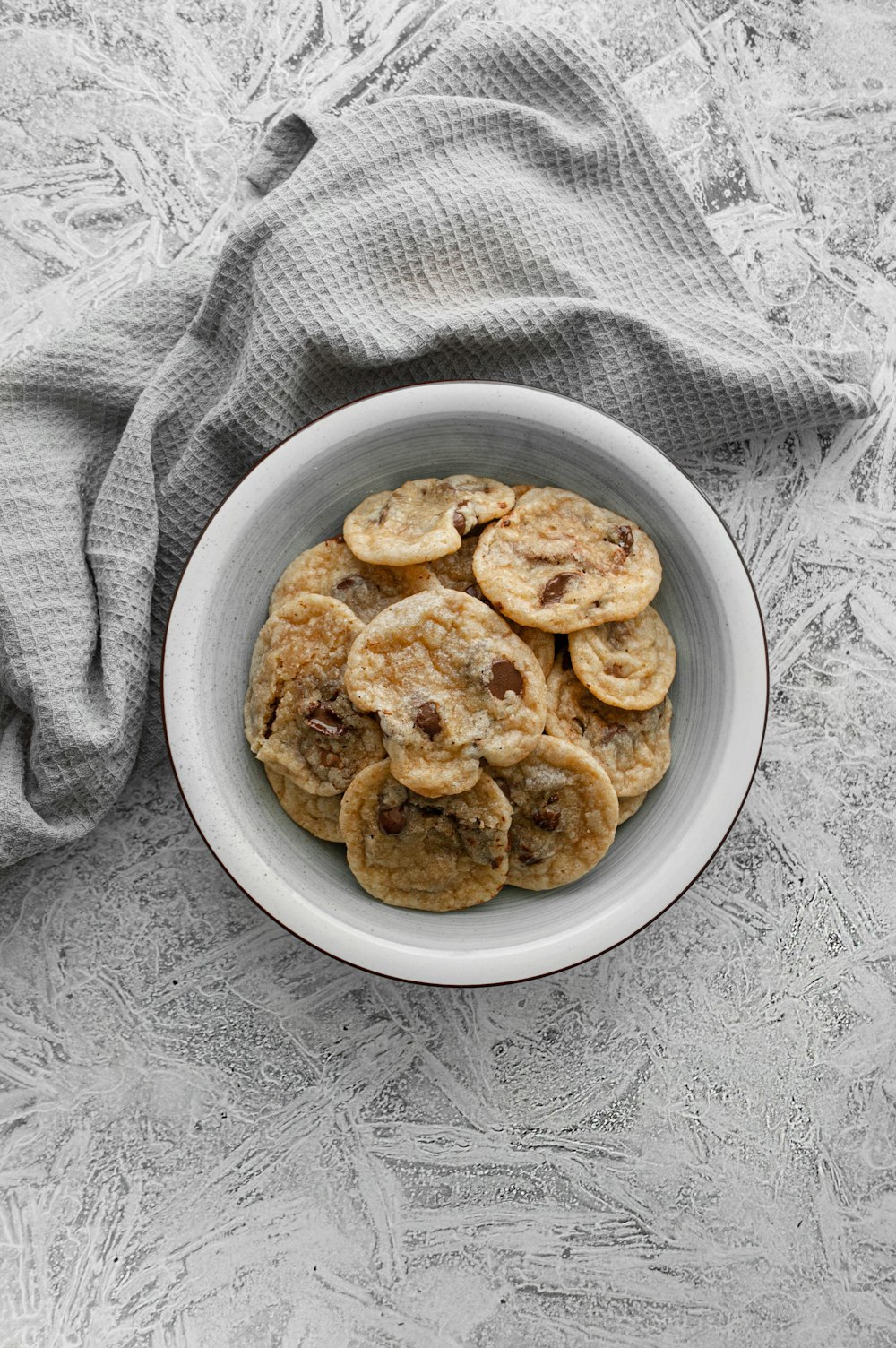 brown cookies on white ceramic bowl