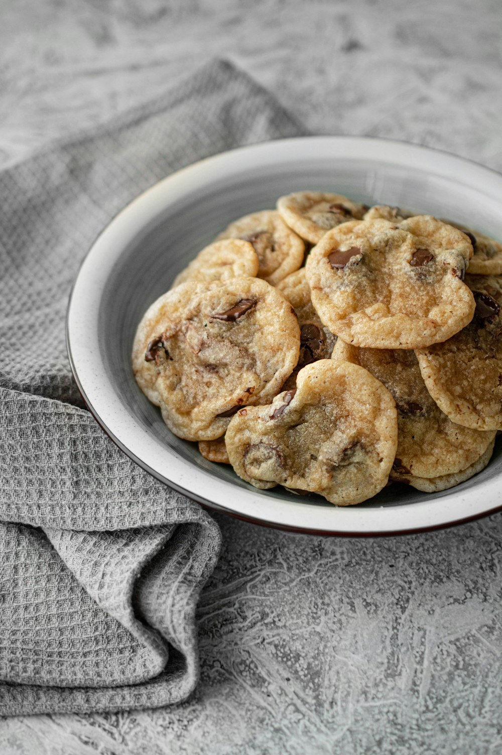 brown cookies on white ceramic bowl