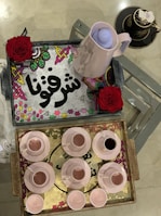 Luxurious silver serving tray adorned with classic Arabian motifs on a velvet cloth