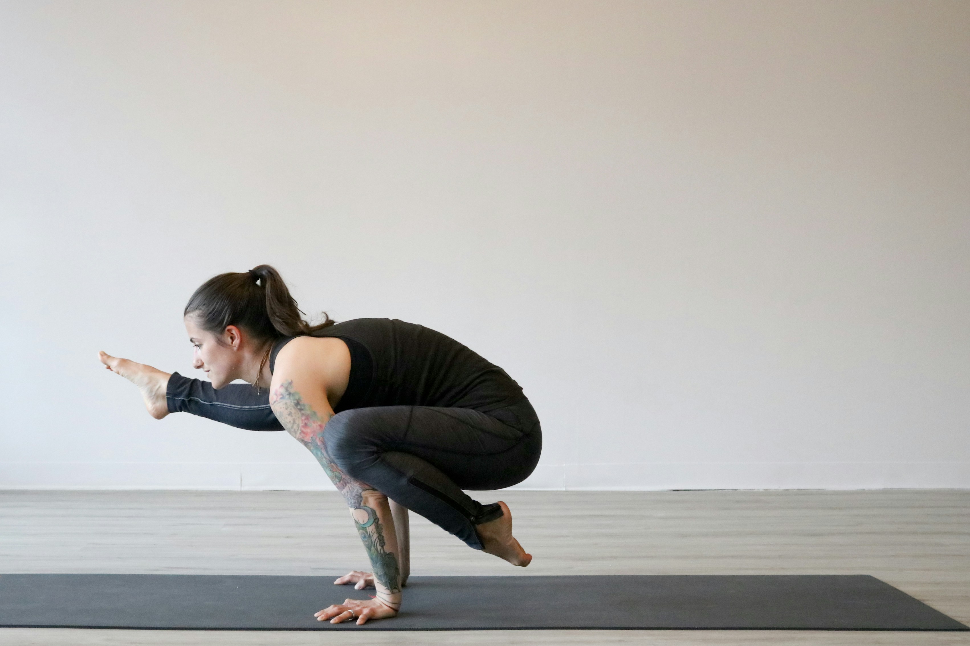 woman doing advanced yoga pose