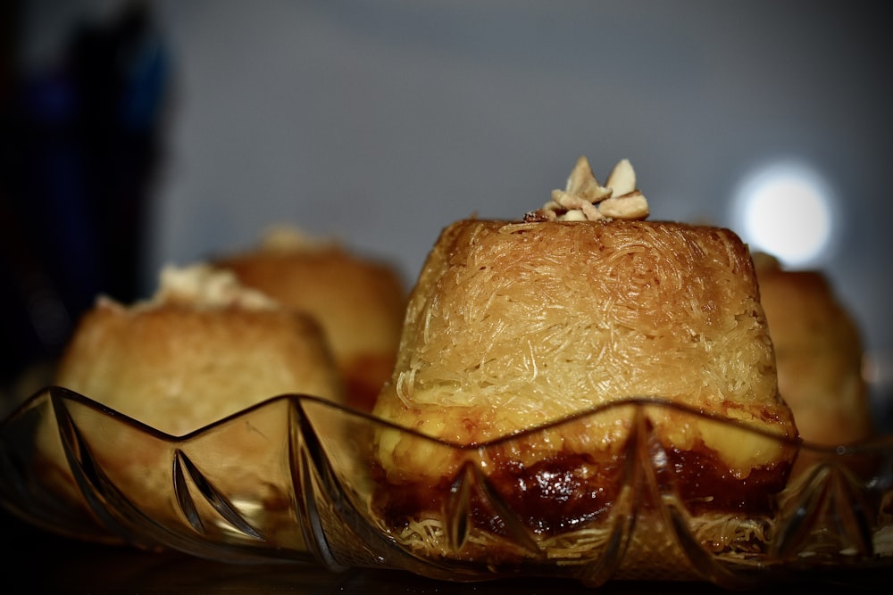 burger with cheese on clear glass bowl