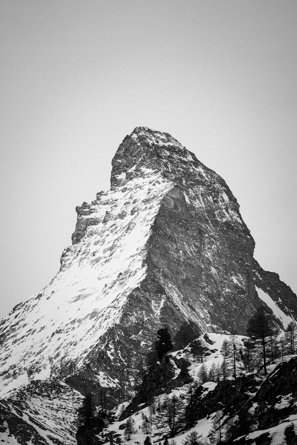 snow covered mountain during daytime