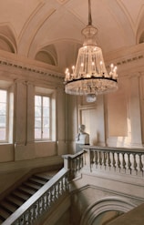 woman in white dress walking on staircase