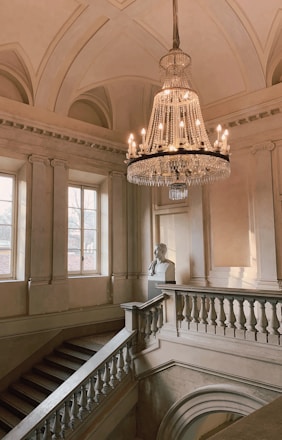 woman in white dress walking on staircase