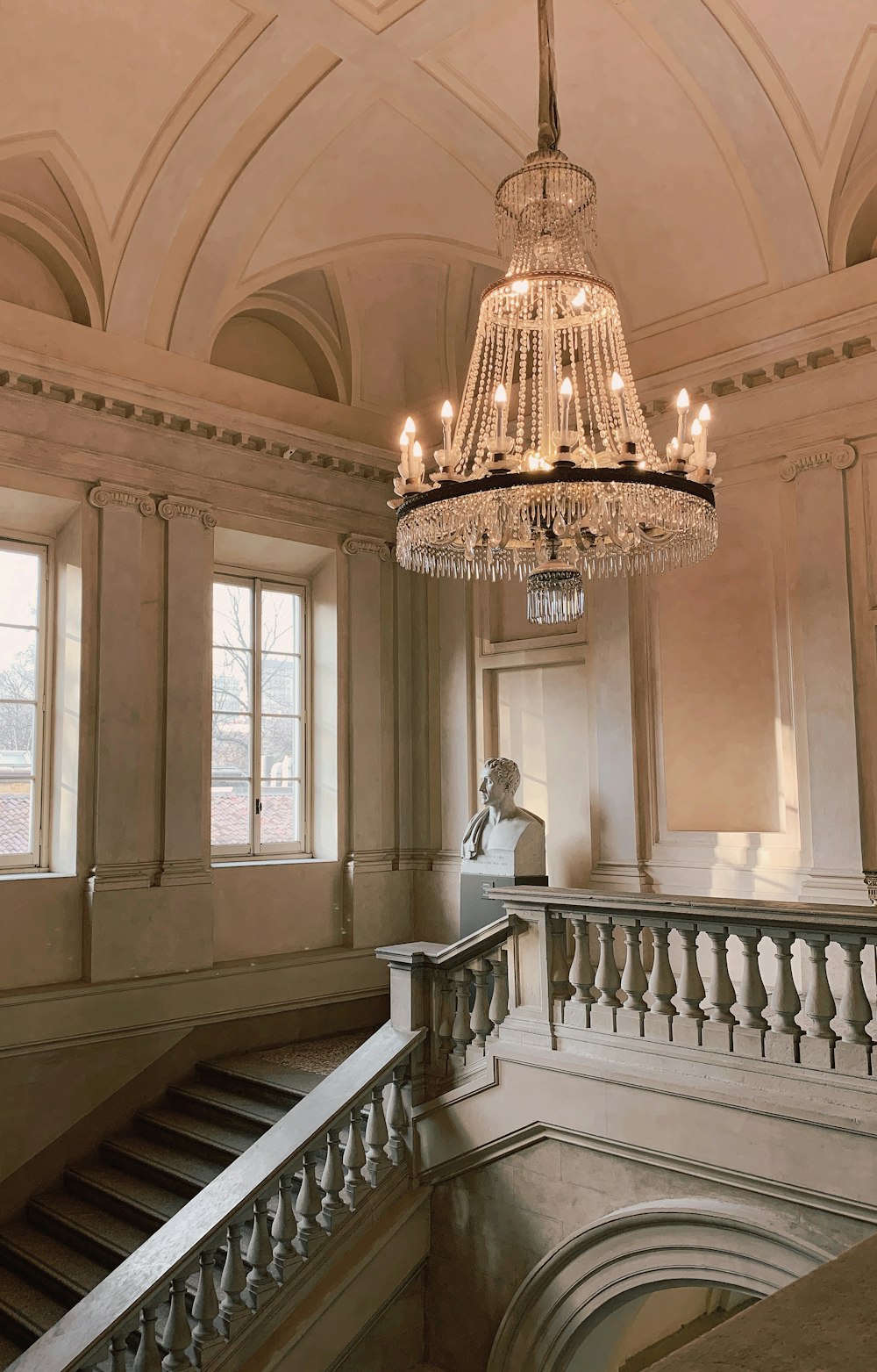 woman in white dress walking on staircase