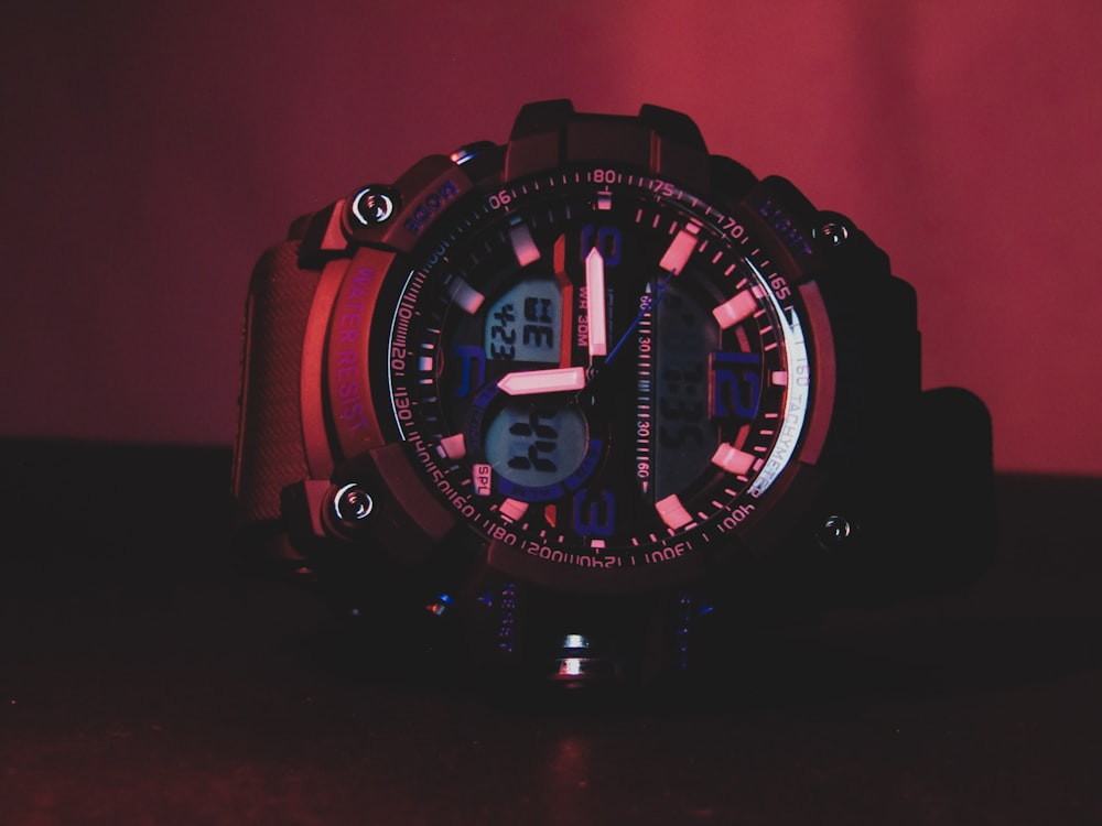 red and black digital watch
