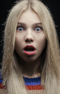 woman with blonde hair and red lipstick
