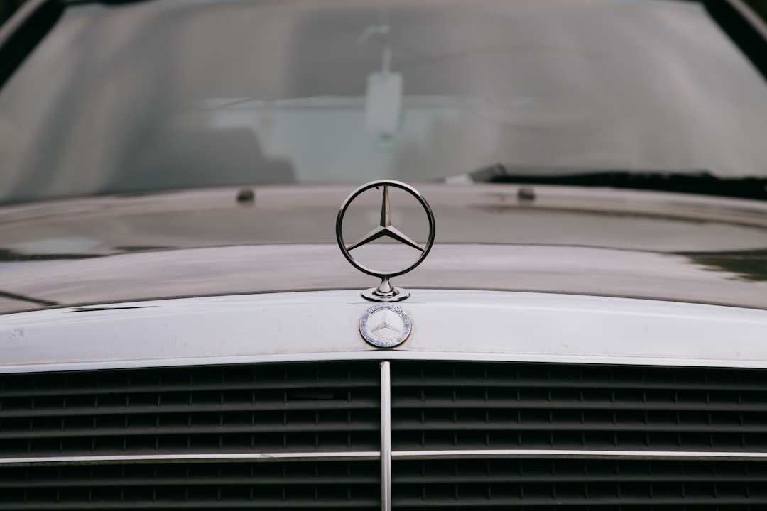 silver mercedes benz car with silver door handle