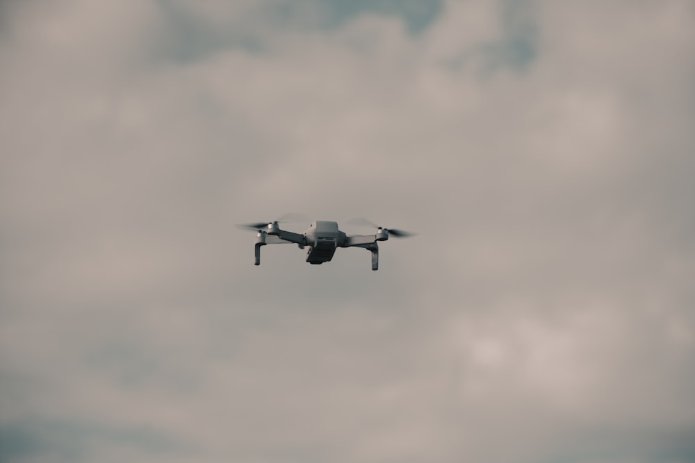 gray fighter plane flying in the sky