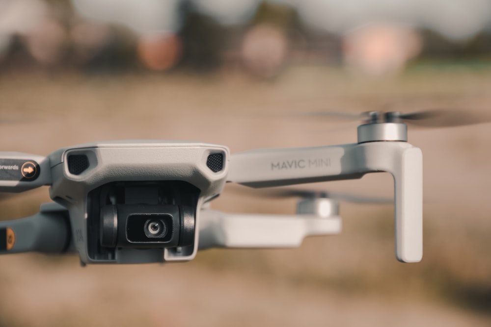 gray and black drone in tilt shift lens