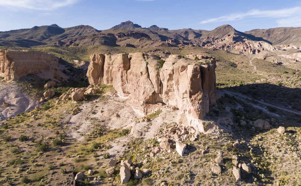 brown rocky mountain under blue sky during daytime