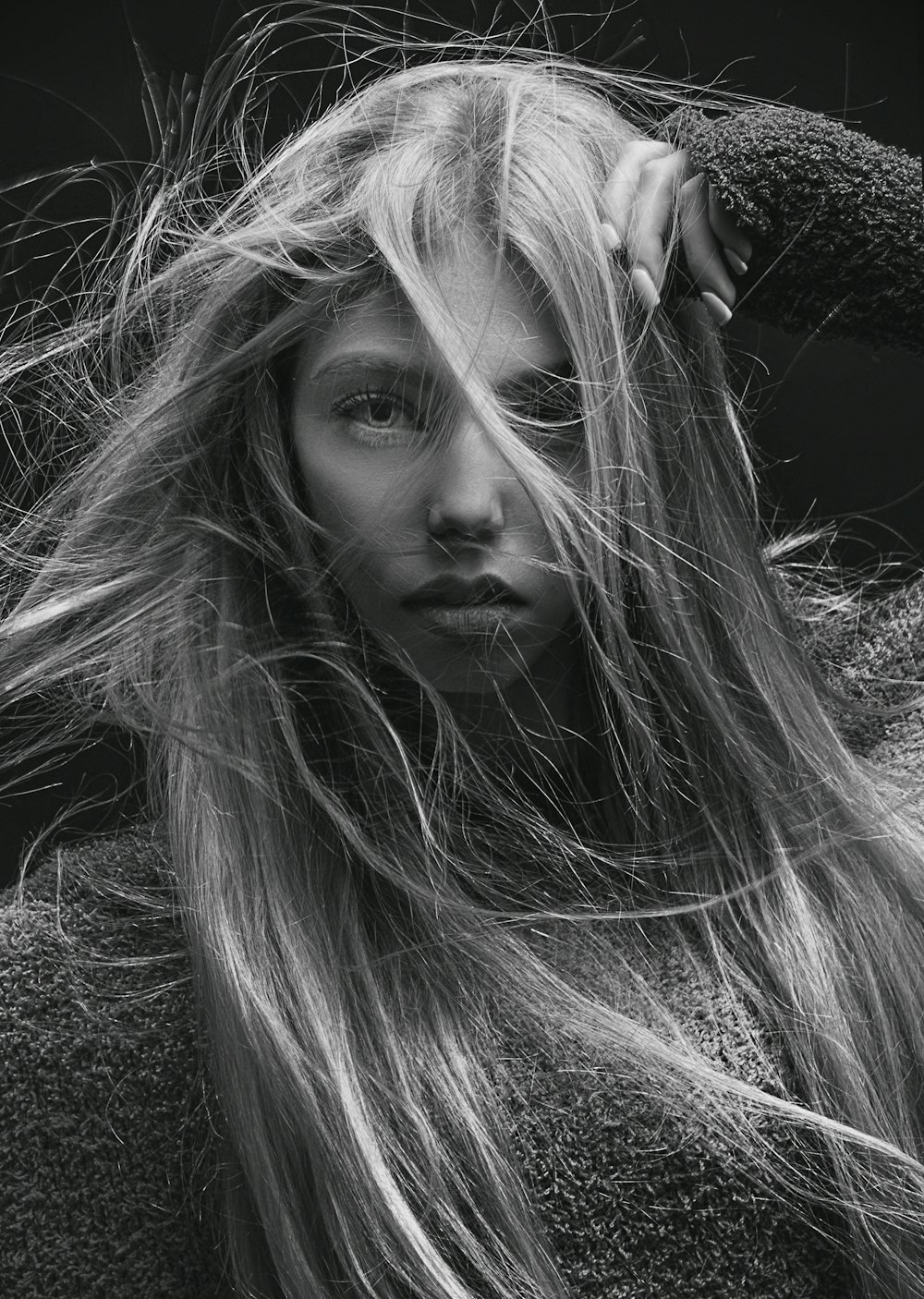 grayscale photo of woman with long hair