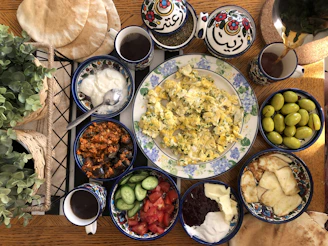 A delicious breakfast spread featuring tost, gözleme, and fresh tea at Keyifköşesi