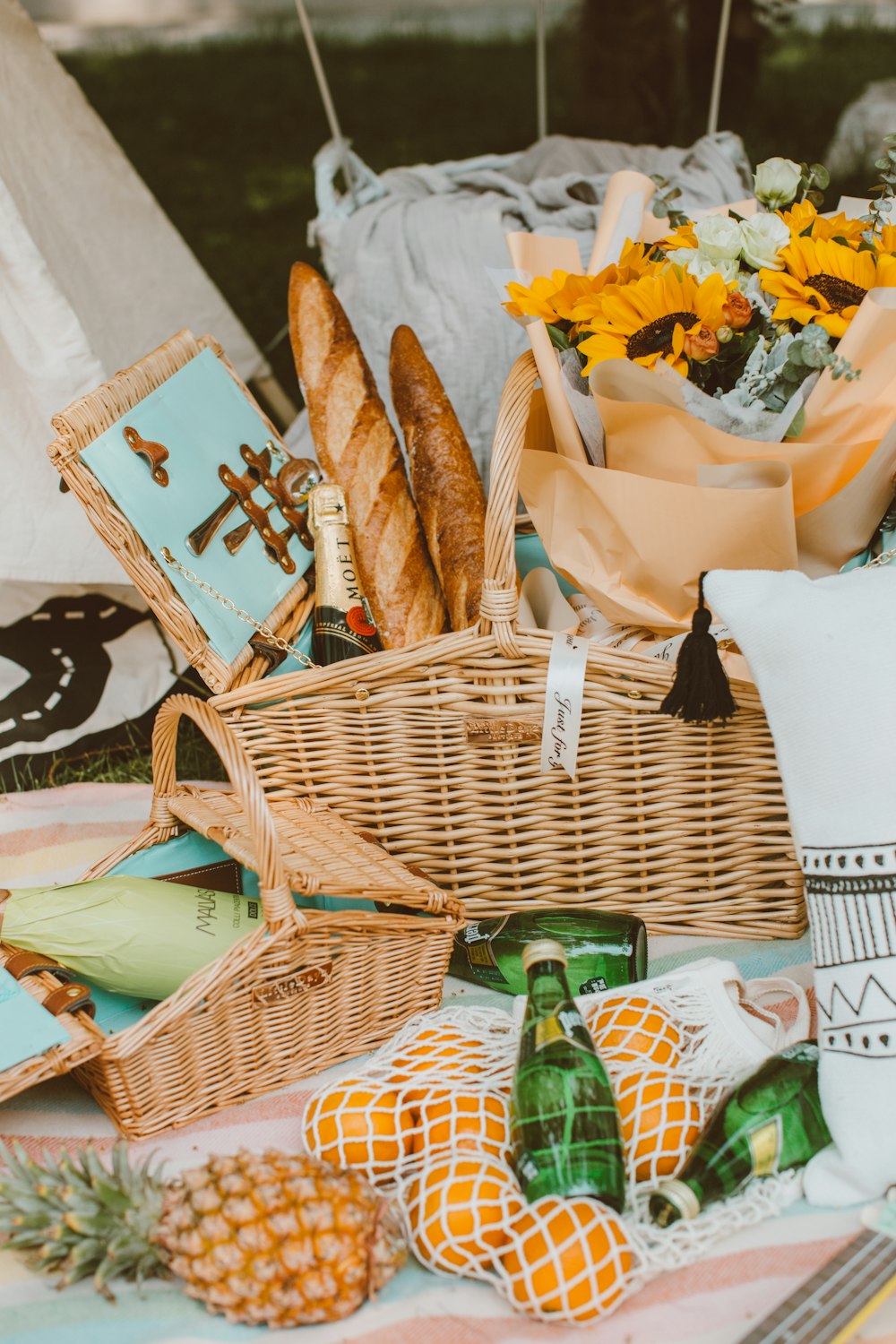 brown wicker basket with white and yellow flowers