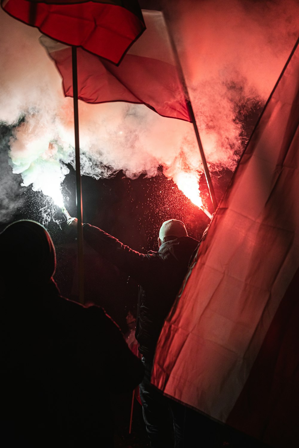 red and white tent with fire