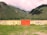 A breathtaking view of the Heaven Gate with lush greenery in the background.
