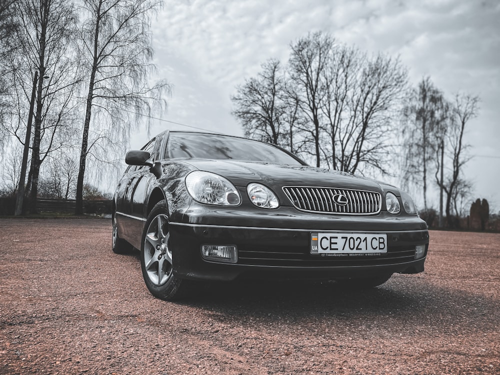 black bmw car on brown field