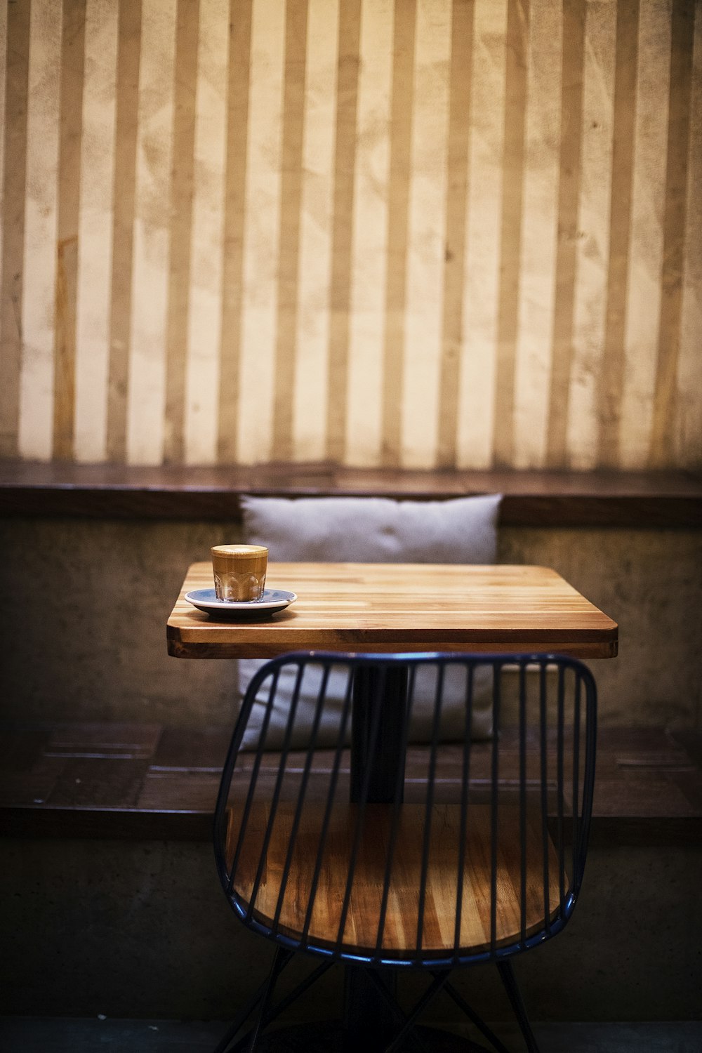 brown wooden table with white table cloth