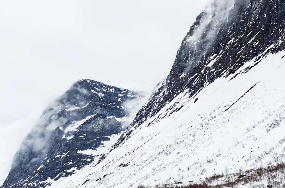 snow covered mountain during daytime