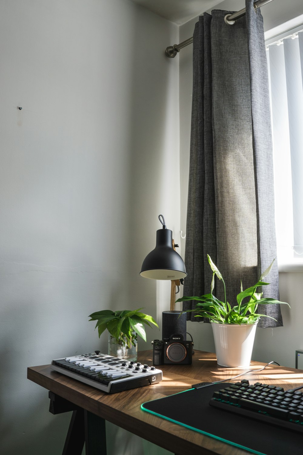 black desk lamp on brown wooden table