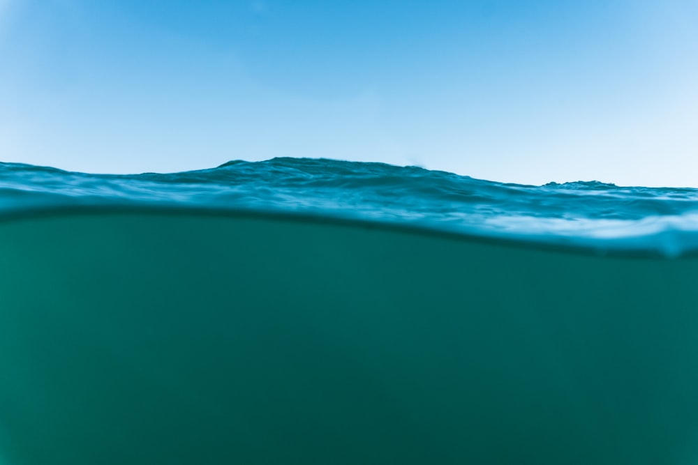 body of water under blue sky during daytime