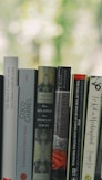 book collection on white textile