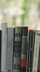 book collection on white textile