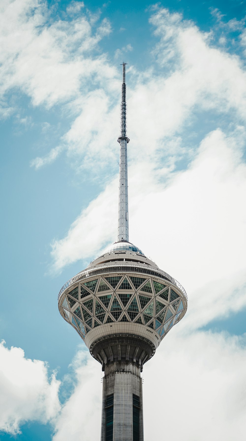 black and white tower under blue sky