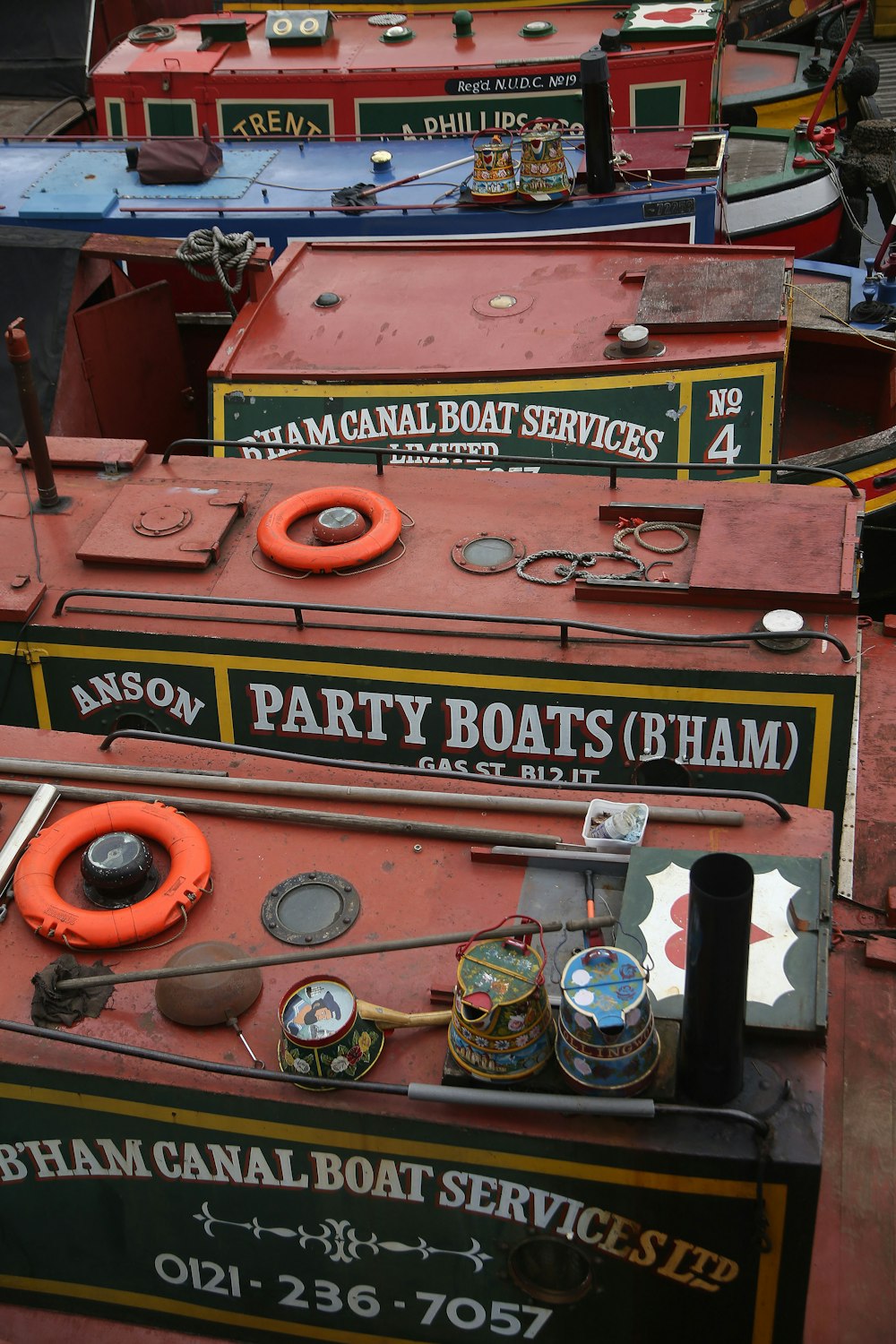 a row of boats sitting next to each other