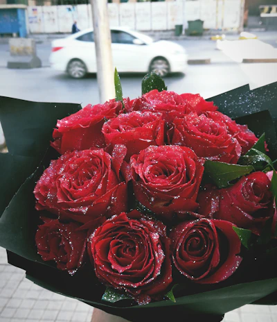 A vibrant bouquet of roses being delivered in a bustling city street, capturing the joy of a personalized gift.